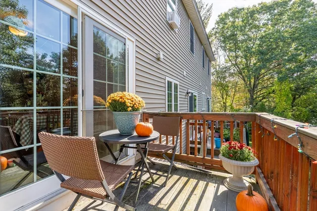 a view of a chair and table in the balcony
