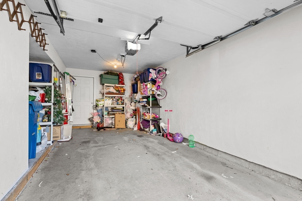 41 Boston Road, Unit 464 Billerica, MA 01862 - Photo 14 of 15 a view of a garage with rack and bicycle