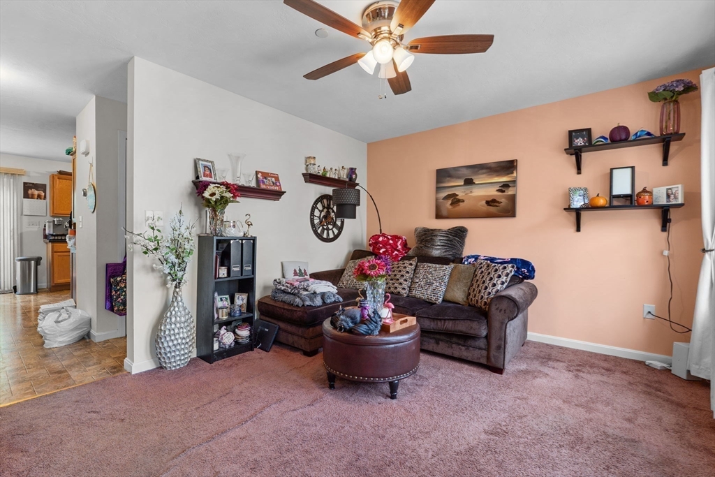 41 Boston Road, Unit 464 Billerica, MA 01862 - Photo 7 of 15 a living room with furniture chess board and a window