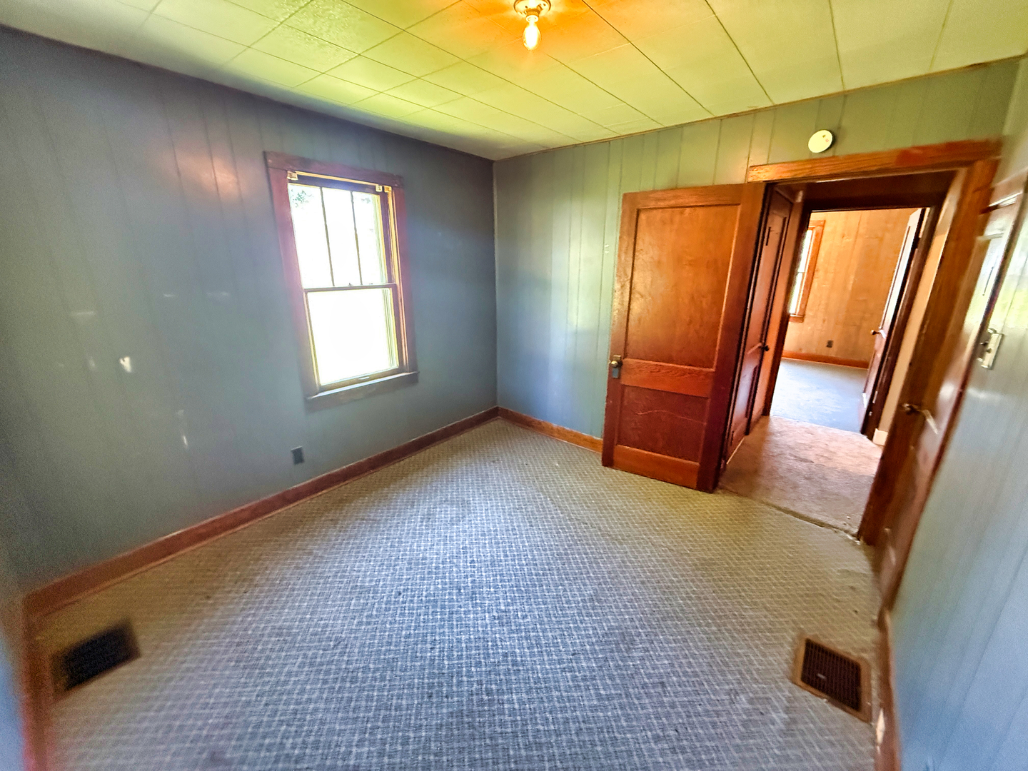 426 South Locust Street Flora, IL 62839 - Photo 27 of 58 a view of an empty room with a window