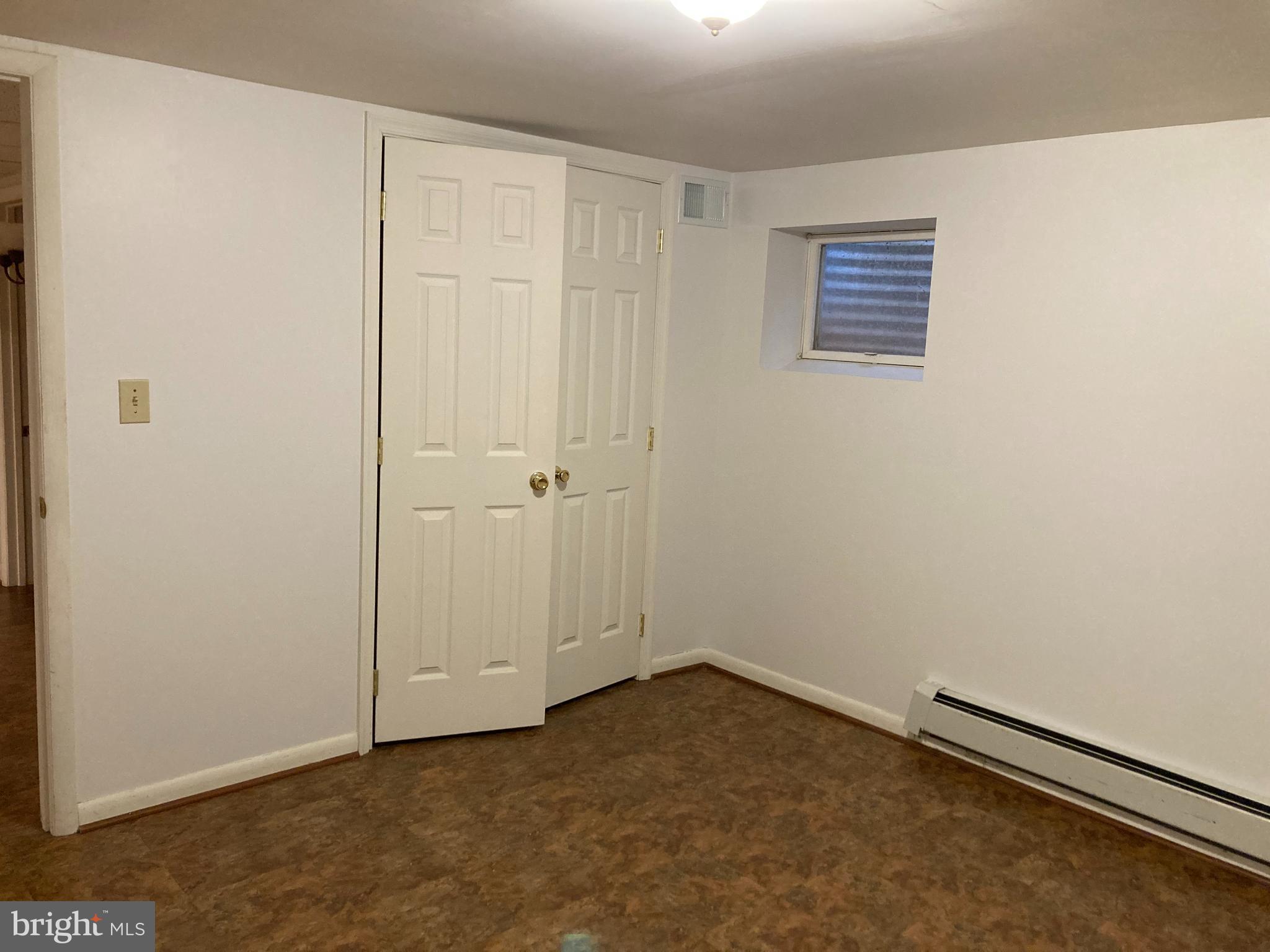 14104 Schaeffer Road Germantown, MD 20874 - Photo 32 of 42 an empty room with a bench