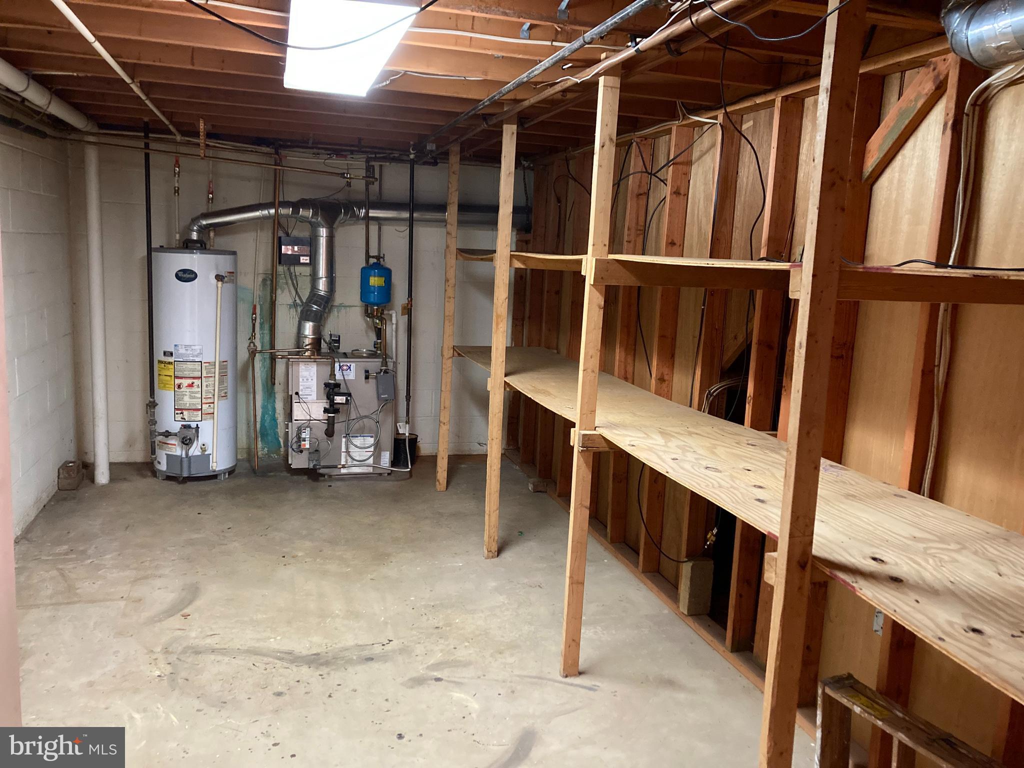 14104 Schaeffer Road Germantown, MD 20874 - Photo 34 of 42 a view of storage and utility room