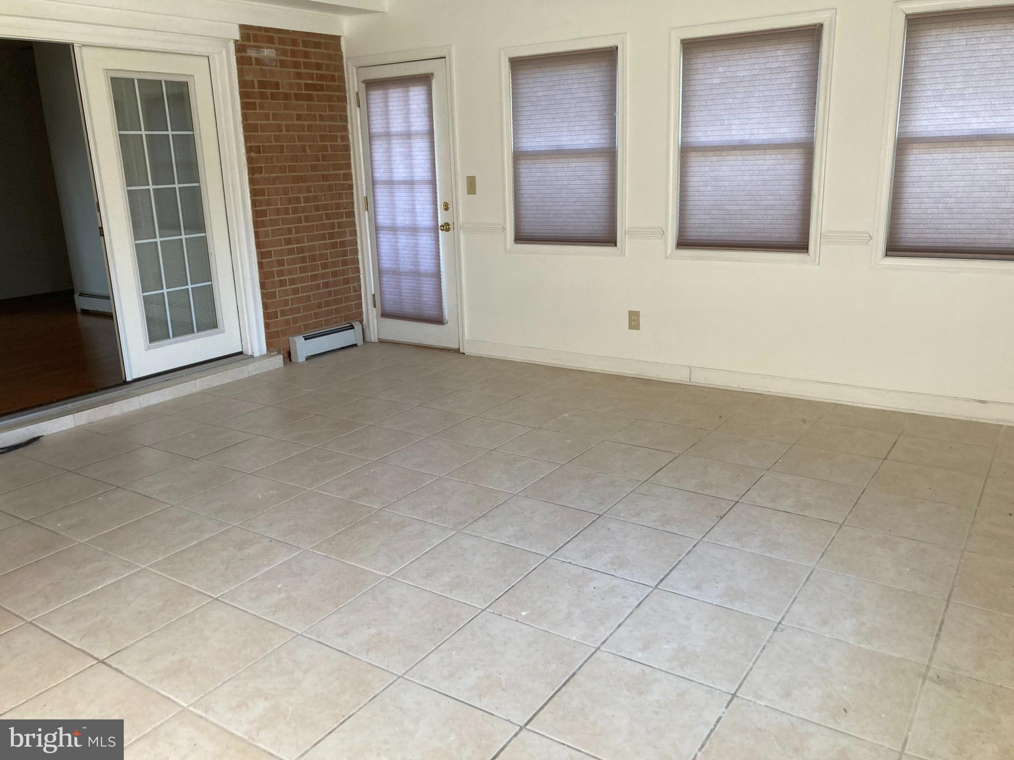 14104 Schaeffer Road Germantown, MD 20874 - Photo 38 of 42 a view of an empty room with windows