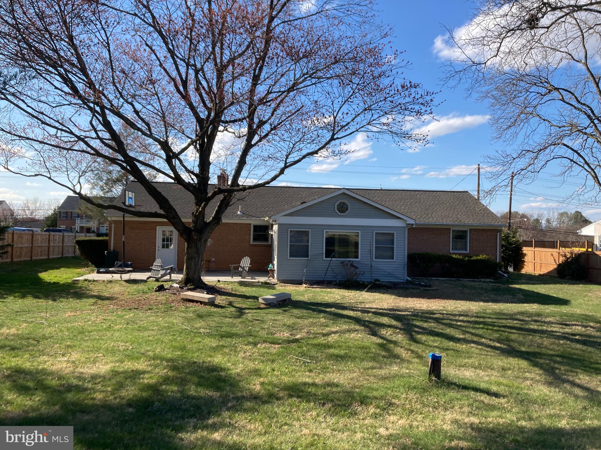 14104 Schaeffer Road Germantown, MD 20874 - Photo 42 of 42 a house that has a tree in front of it