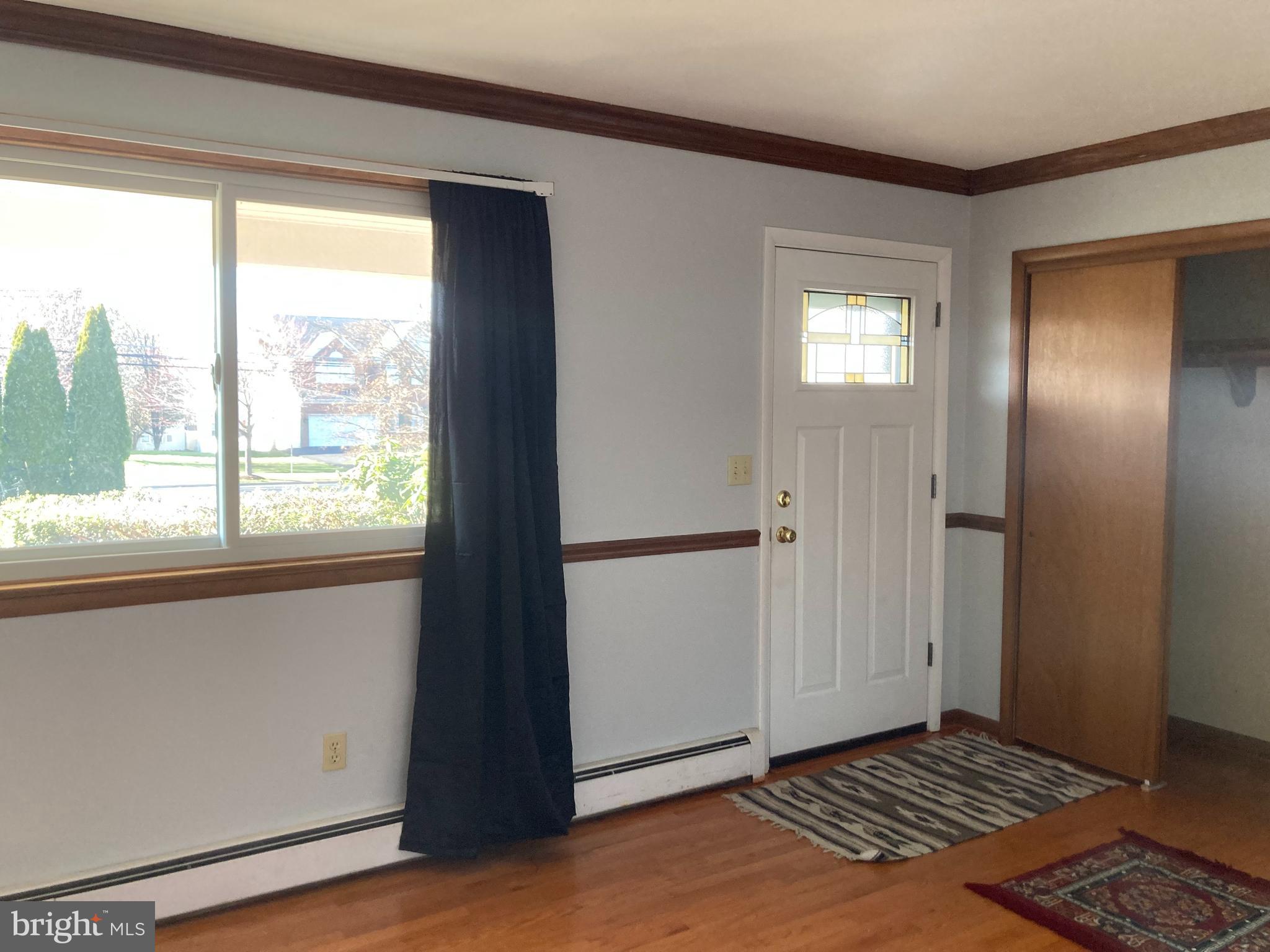 14104 Schaeffer Road Germantown, MD 20874 - Photo 5 of 42 a view of a kitchen with wooden floor and white doors