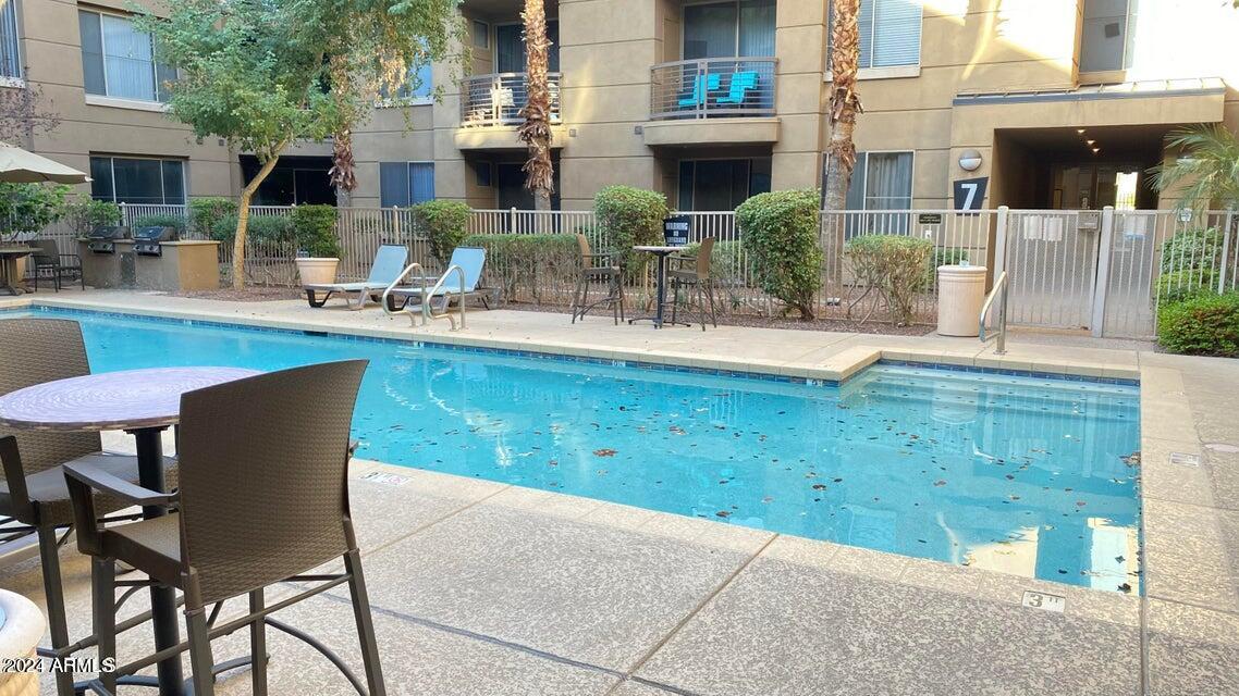 a view of a house with swimming pool