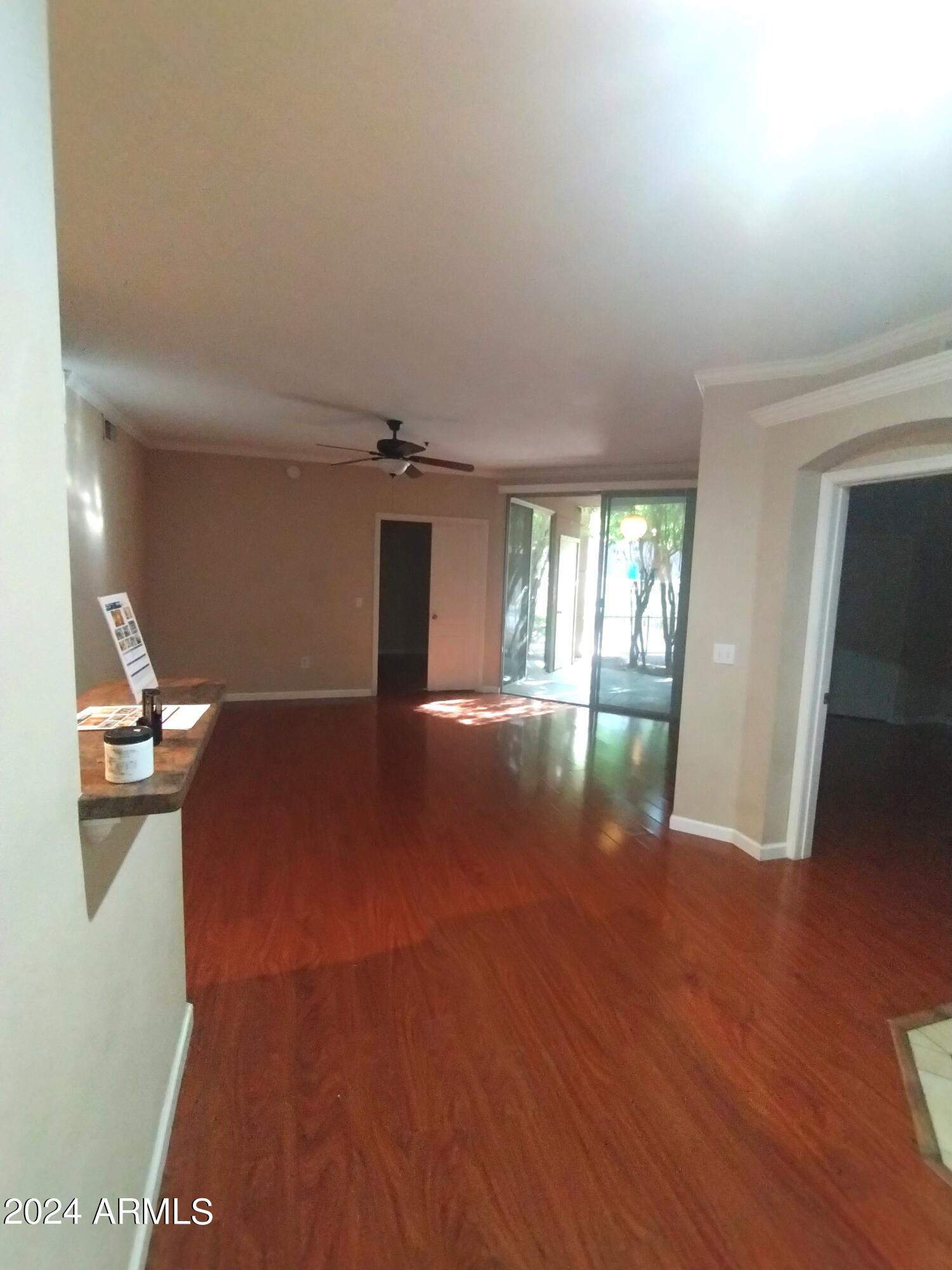 1701 East Colter Street, Unit 165 Phoenix, AZ 85016 - Photo 10 of 33 a view of an empty room with a window