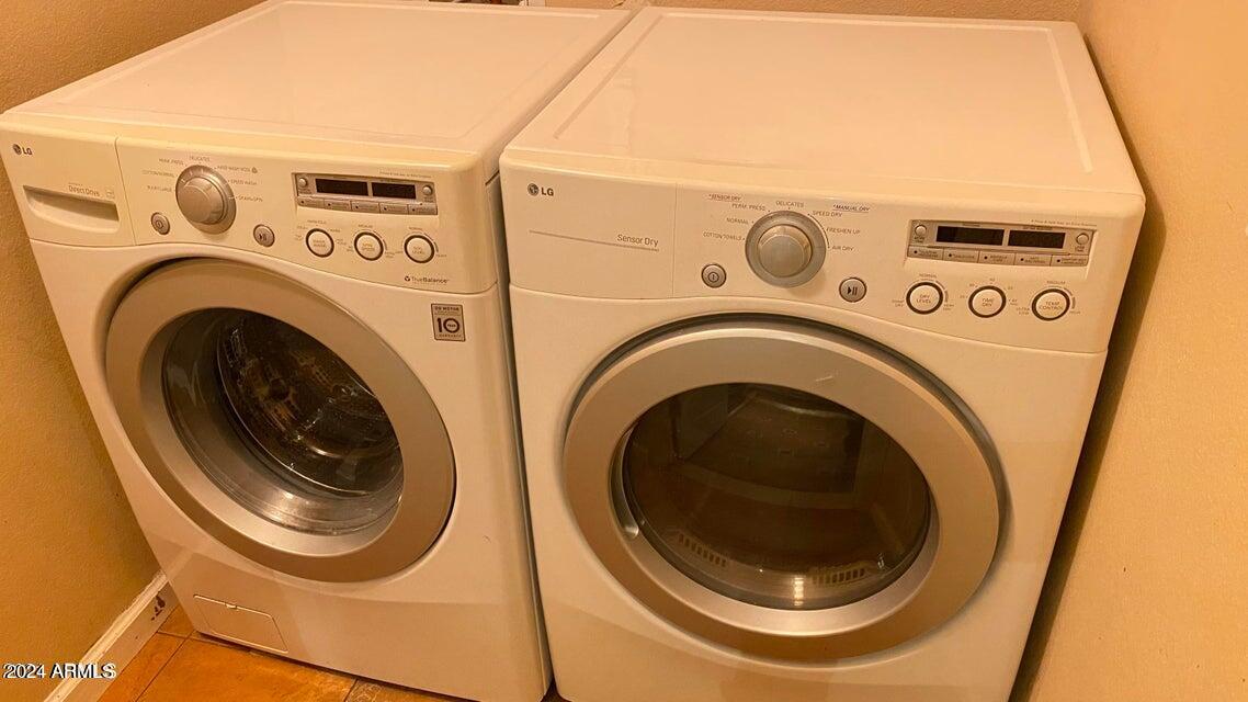 1701 East Colter Street, Unit 165 Phoenix, AZ 85016 - Photo 12 of 33 a utility room with dryer and washer