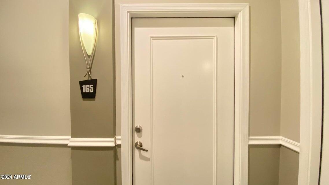 1701 East Colter Street, Unit 165 Phoenix, AZ 85016 - Photo 3 of 33 a bathroom with a mirror