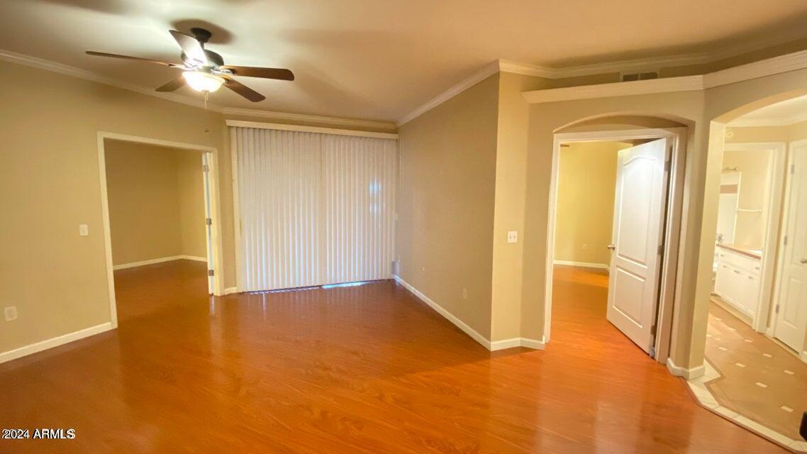 1701 East Colter Street, Unit 165 Phoenix, AZ 85016 - Photo 6 of 33 a view of empty room with ceiling fan