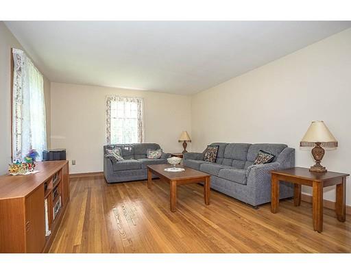 7 Galloway Road Chelmsford, MA 01824 - Photo 7 of 37 a living room with furniture and a wooden floor
