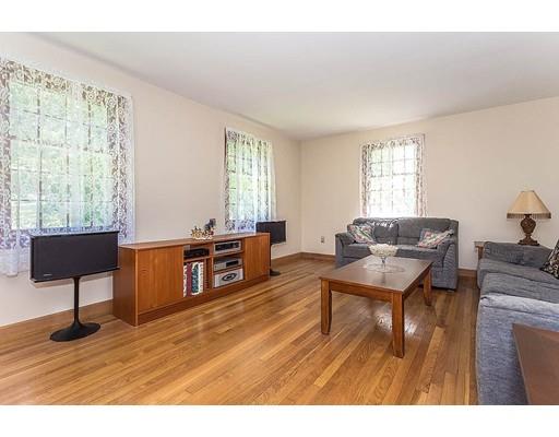 7 Galloway Road Chelmsford, MA 01824 - Photo 8 of 37 a living room with furniture and a wooden floor