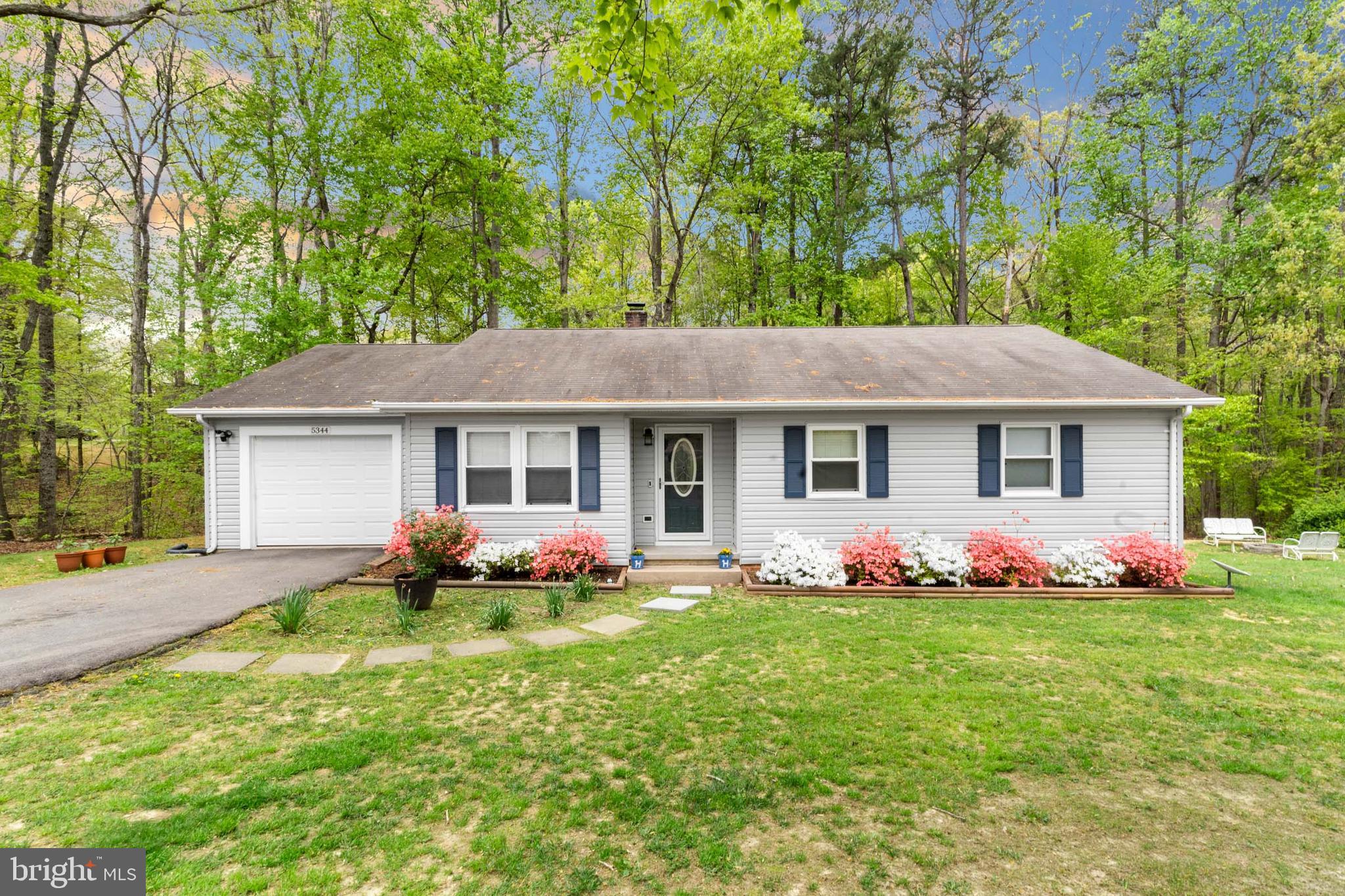 5344 Courtneys Corner Road Sumerduck, VA 22742 - Photo 1 of 56 a front view of house with garden