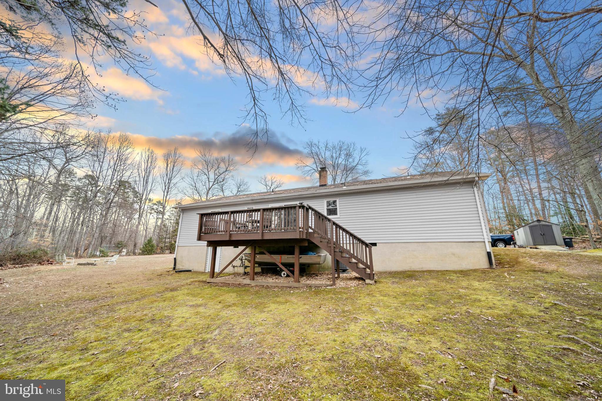 5344 Courtneys Corner Road Sumerduck, VA 22742 - Photo 28 of 56 a view of a backyard with a large tree