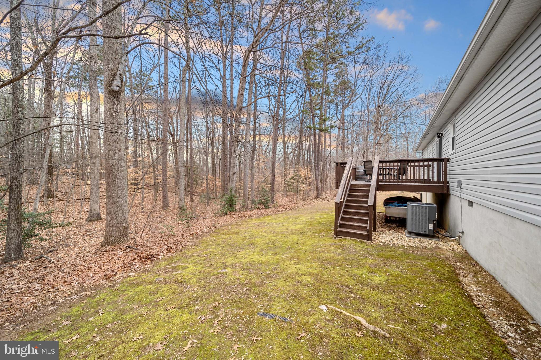 5344 Courtneys Corner Road Sumerduck, VA 22742 - Photo 44 of 56 a view of a backyard with a barn