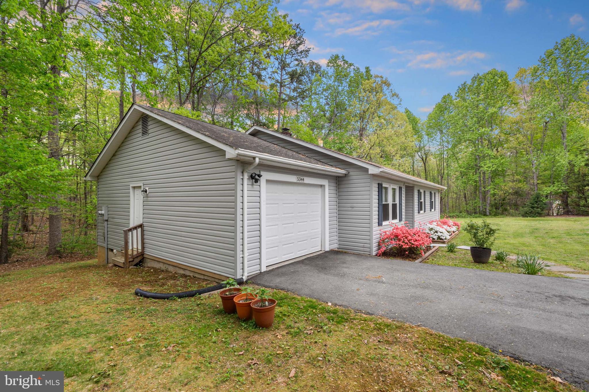 5344 Courtneys Corner Road Sumerduck, VA 22742 - Photo 52 of 56 a view of a house with a yard