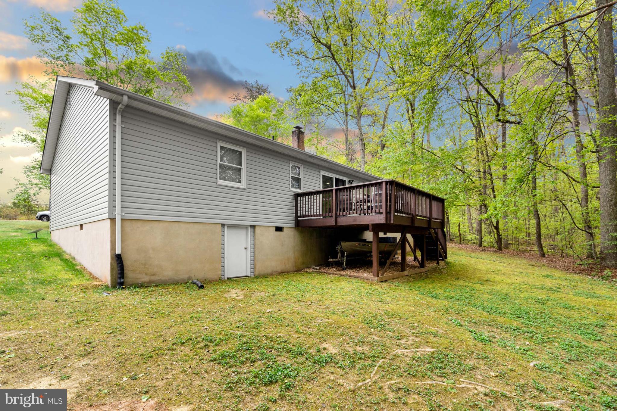 5344 Courtneys Corner Road Sumerduck, VA 22742 - Photo 53 of 56 a view of a house with backyard and sitting area