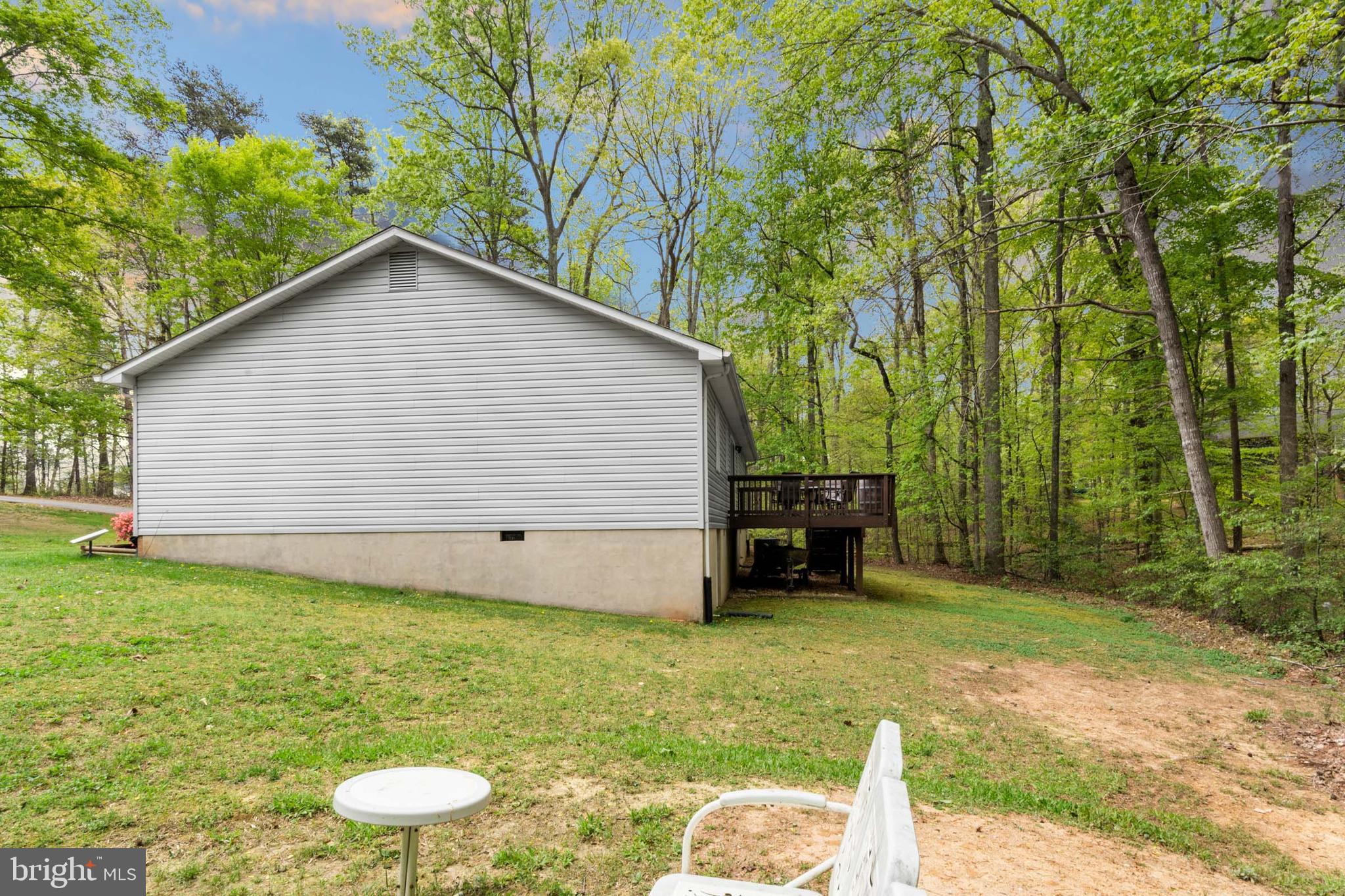 5344 Courtneys Corner Road Sumerduck, VA 22742 - Photo 55 of 56 a backyard of a house with lots of green space