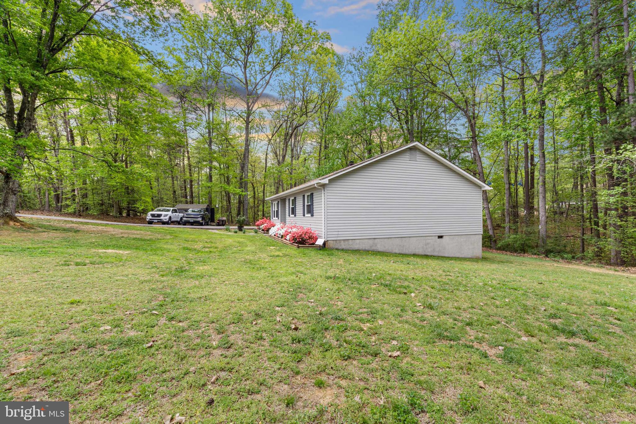 5344 Courtneys Corner Road Sumerduck, VA 22742 - Photo 56 of 56 a view of a house with backyard