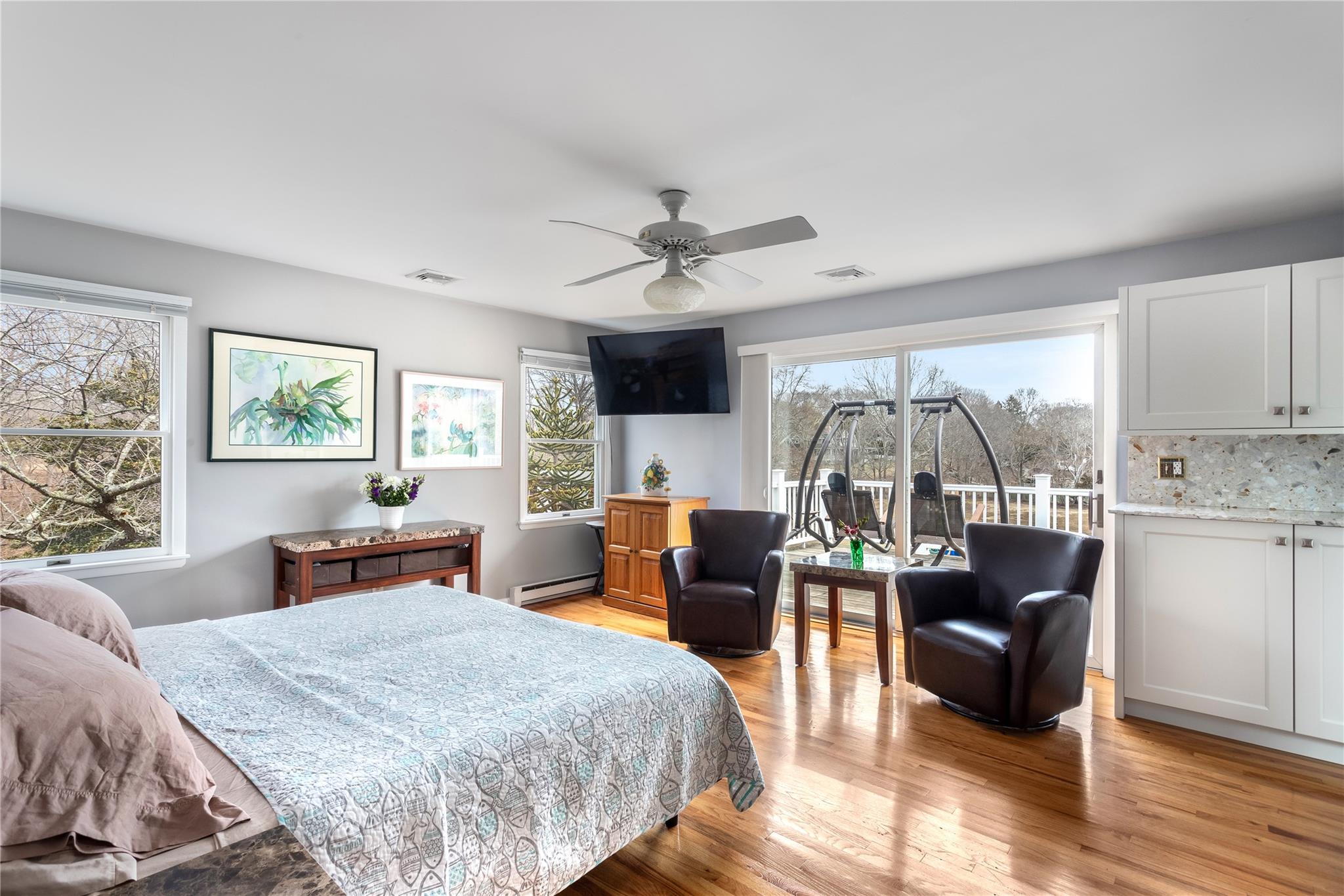 15 South Menantic Road Shelter Island, NY 11964 - Photo 16 of 44 a living room with furniture and a large window