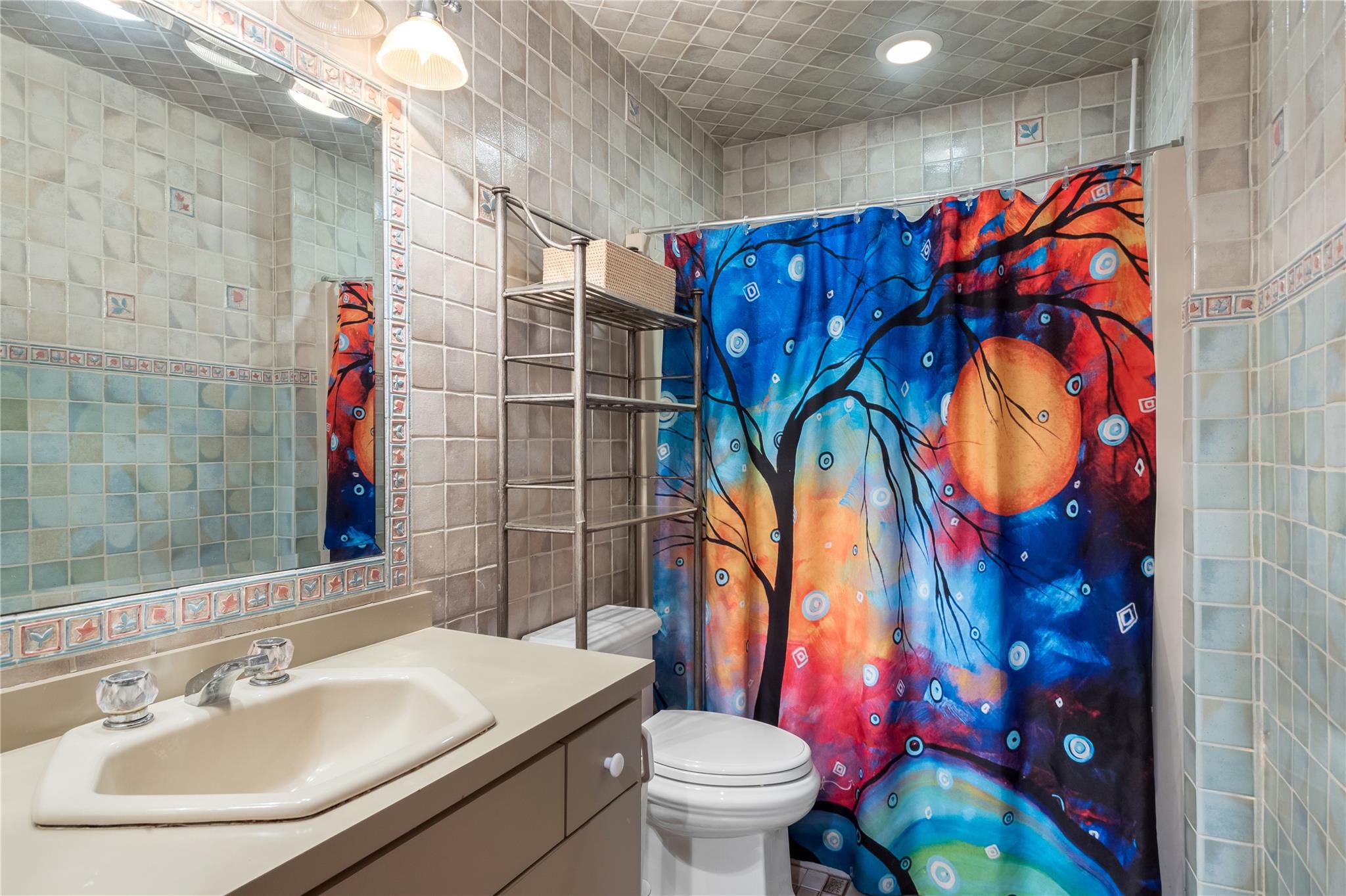 15 South Menantic Road Shelter Island, NY 11964 - Photo 19 of 44 a bathroom with a sink toilet and shower