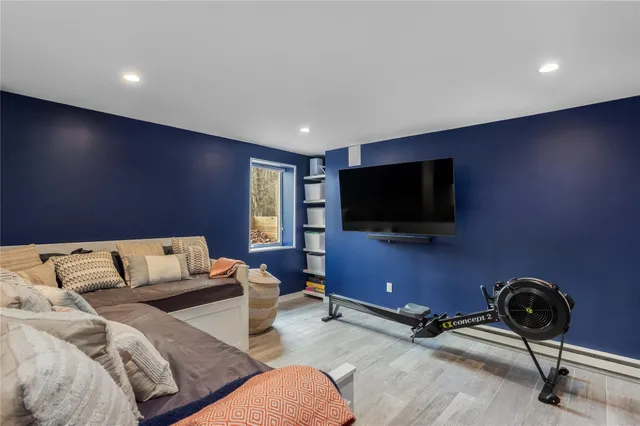 a living room with furniture and a window