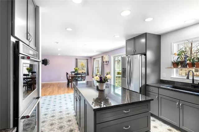 a backyard of a house with lots of green space