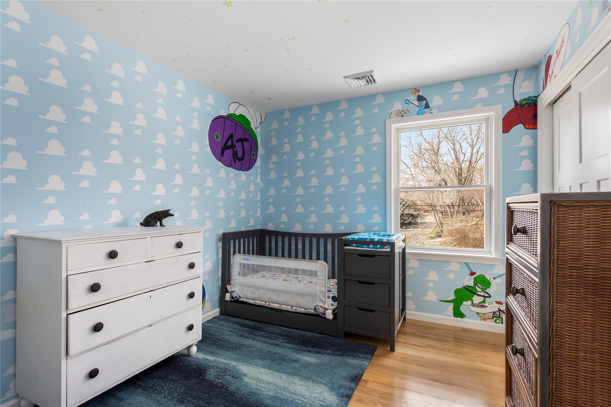 15 South Menantic Road Shelter Island, NY 11964 - Photo 40 of 44 a bedroom with a bed and a dresser