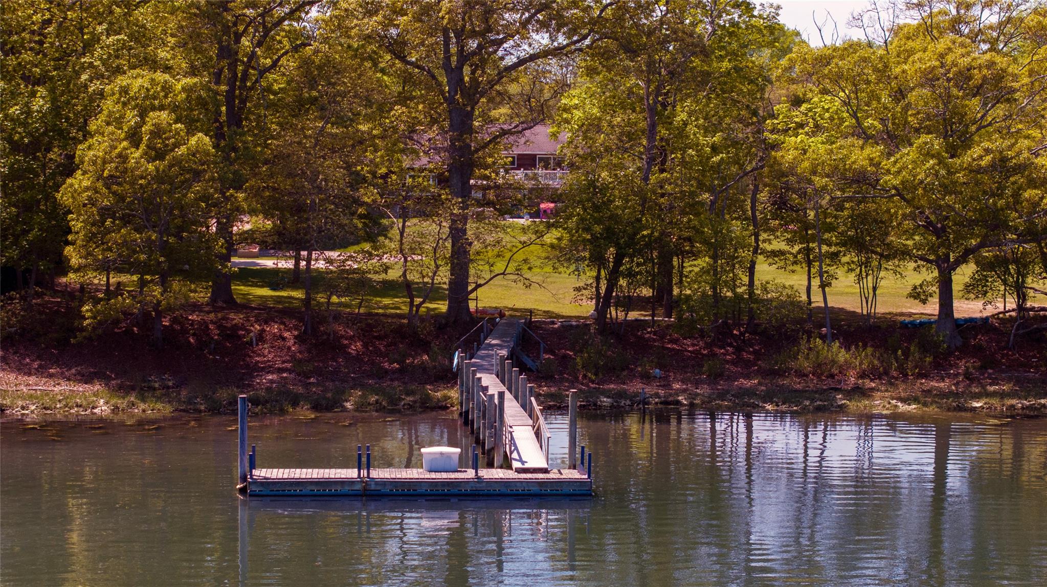 15 South Menantic Road Shelter Island, NY 11964 - Photo 8 of 44 a view of house with outdoor space