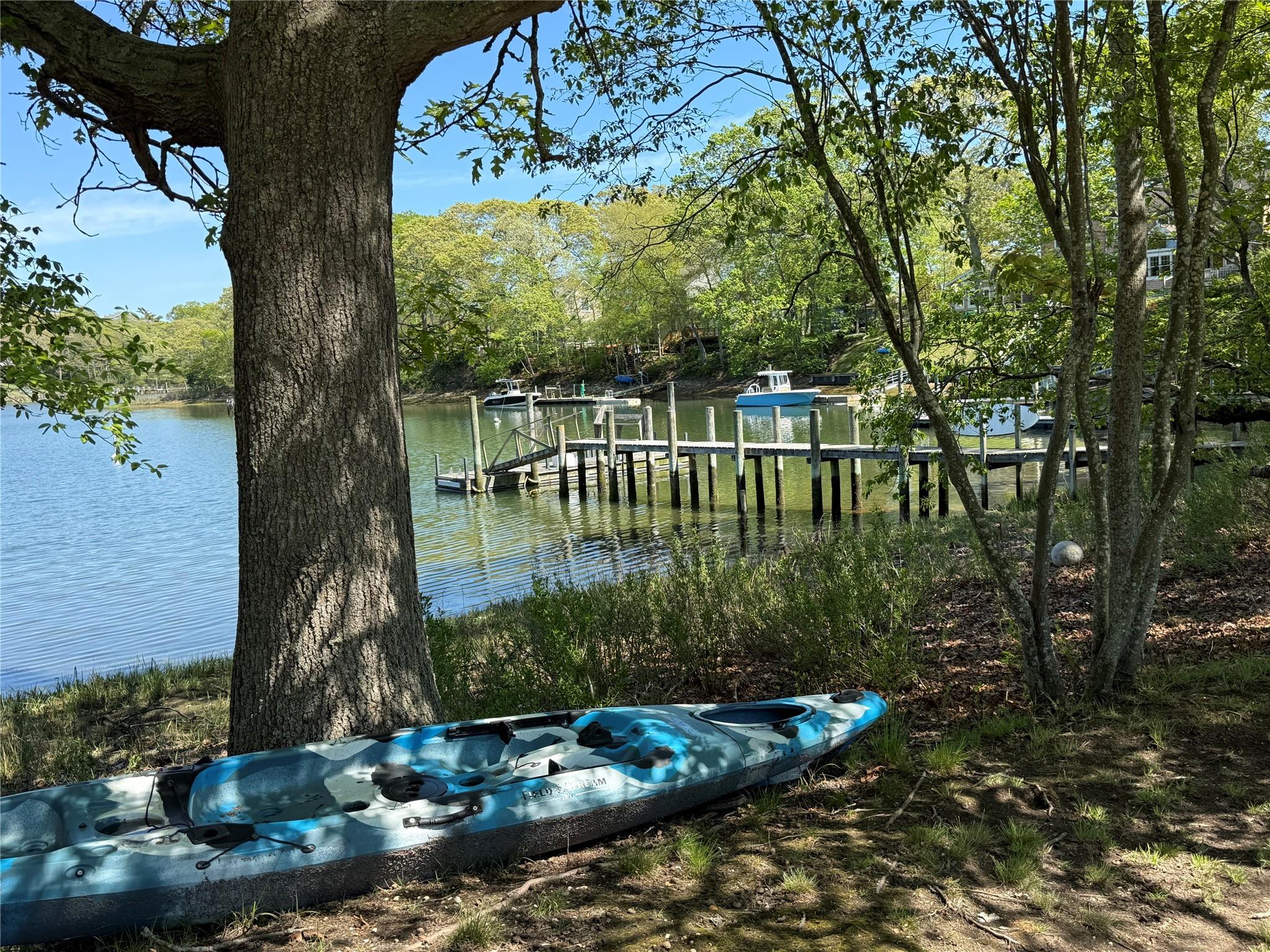 15 South Menantic Road Shelter Island, NY 11964 - Photo 9 of 44 a view of a lake in a backyard