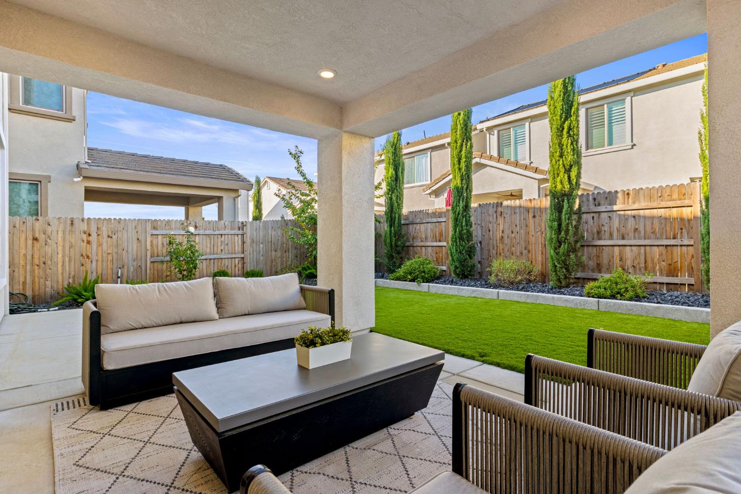 3017 Checkerspot Street Roseville, CA 95747 - Photo 18 of 57 a living room with furniture and a garden
