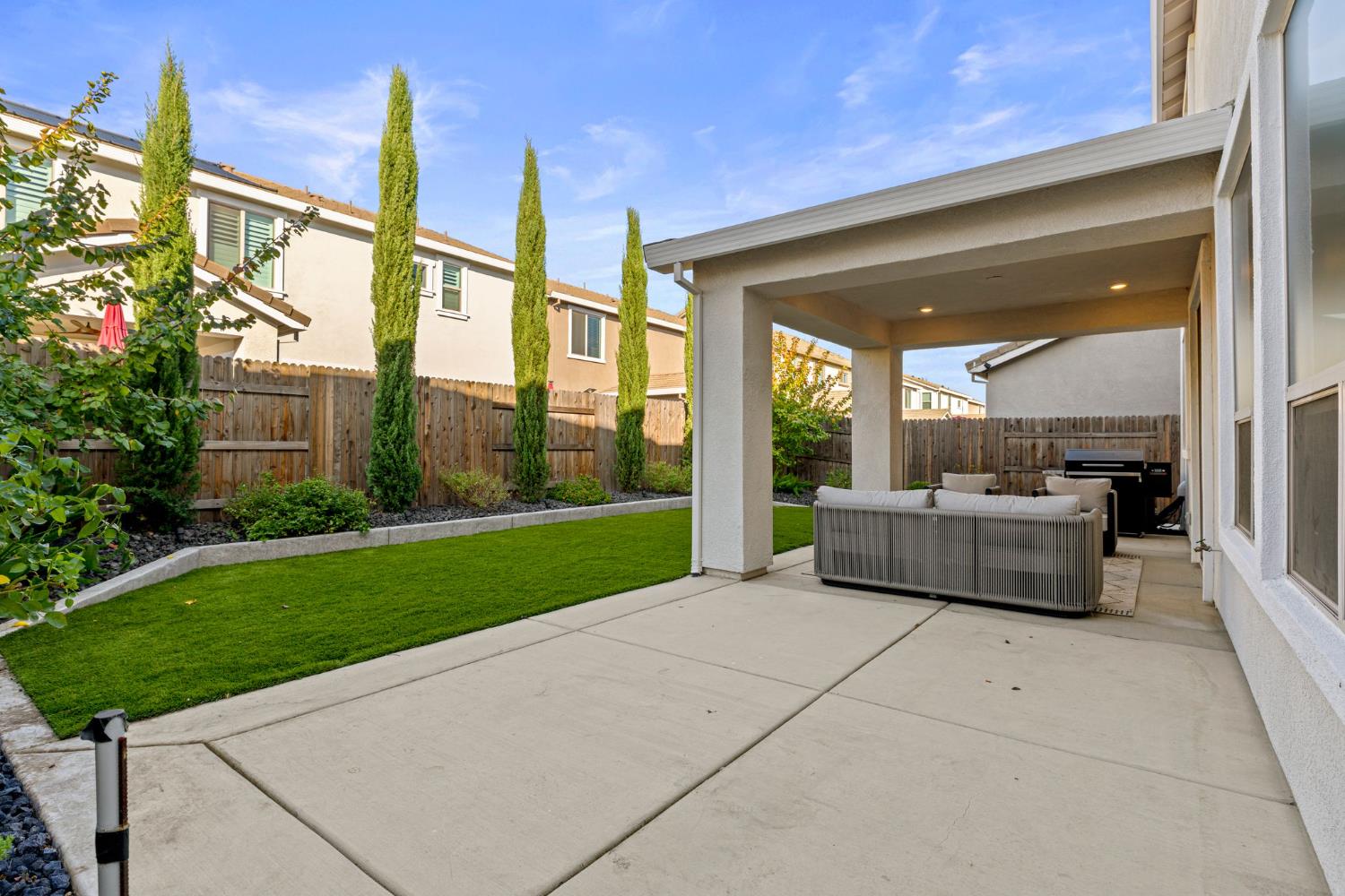 3017 Checkerspot Street Roseville, CA 95747 - Photo 20 of 57 a view of a patio with couches and table potted plants