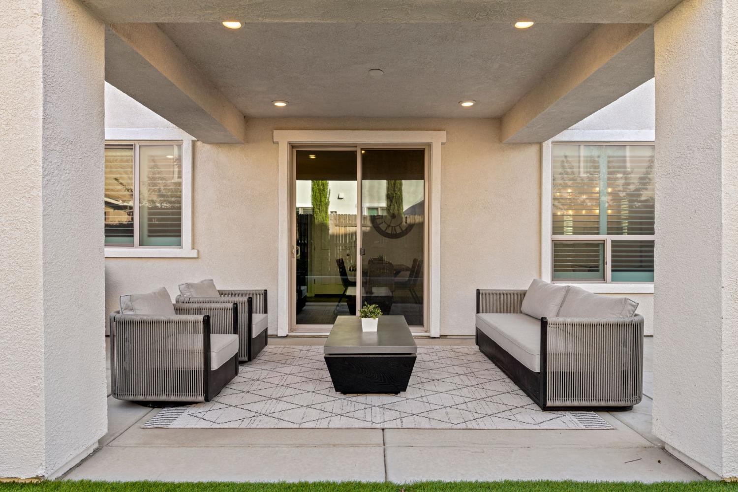 3017 Checkerspot Street Roseville, CA 95747 - Photo 24 of 57 a living room with furniture and a potted plant