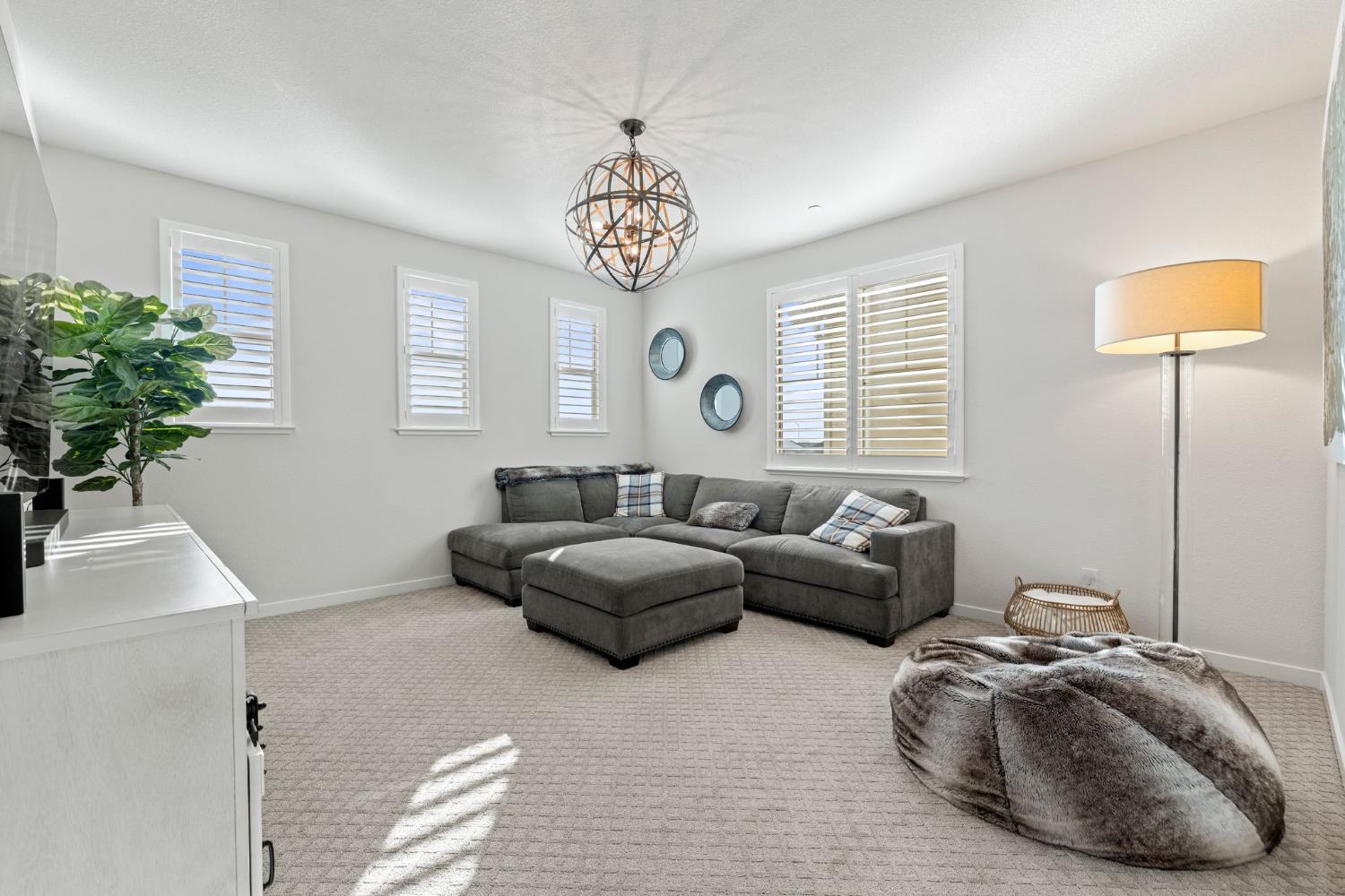 3017 Checkerspot Street Roseville, CA 95747 - Photo 34 of 57 a living room with furniture and a window