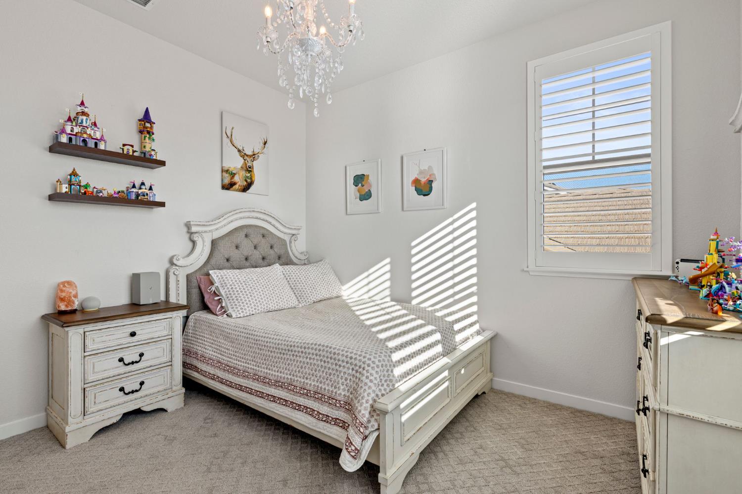 3017 Checkerspot Street Roseville, CA 95747 - Photo 39 of 57 a bedroom with a bed and a window