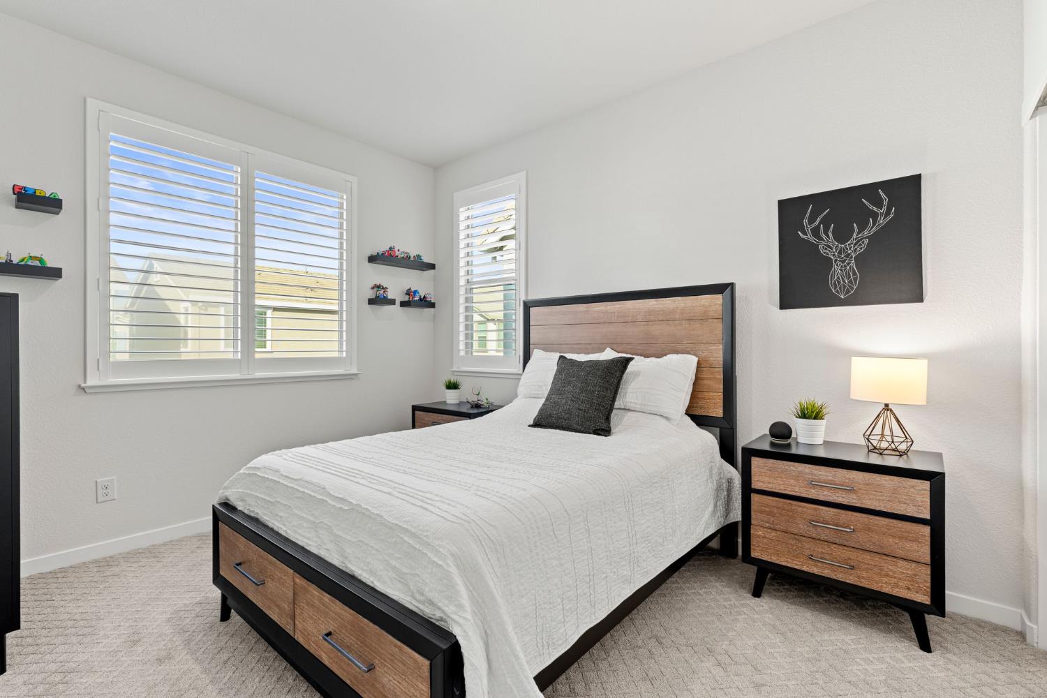 3017 Checkerspot Street Roseville, CA 95747 - Photo 41 of 57 a bedroom with a bed dresser and a window