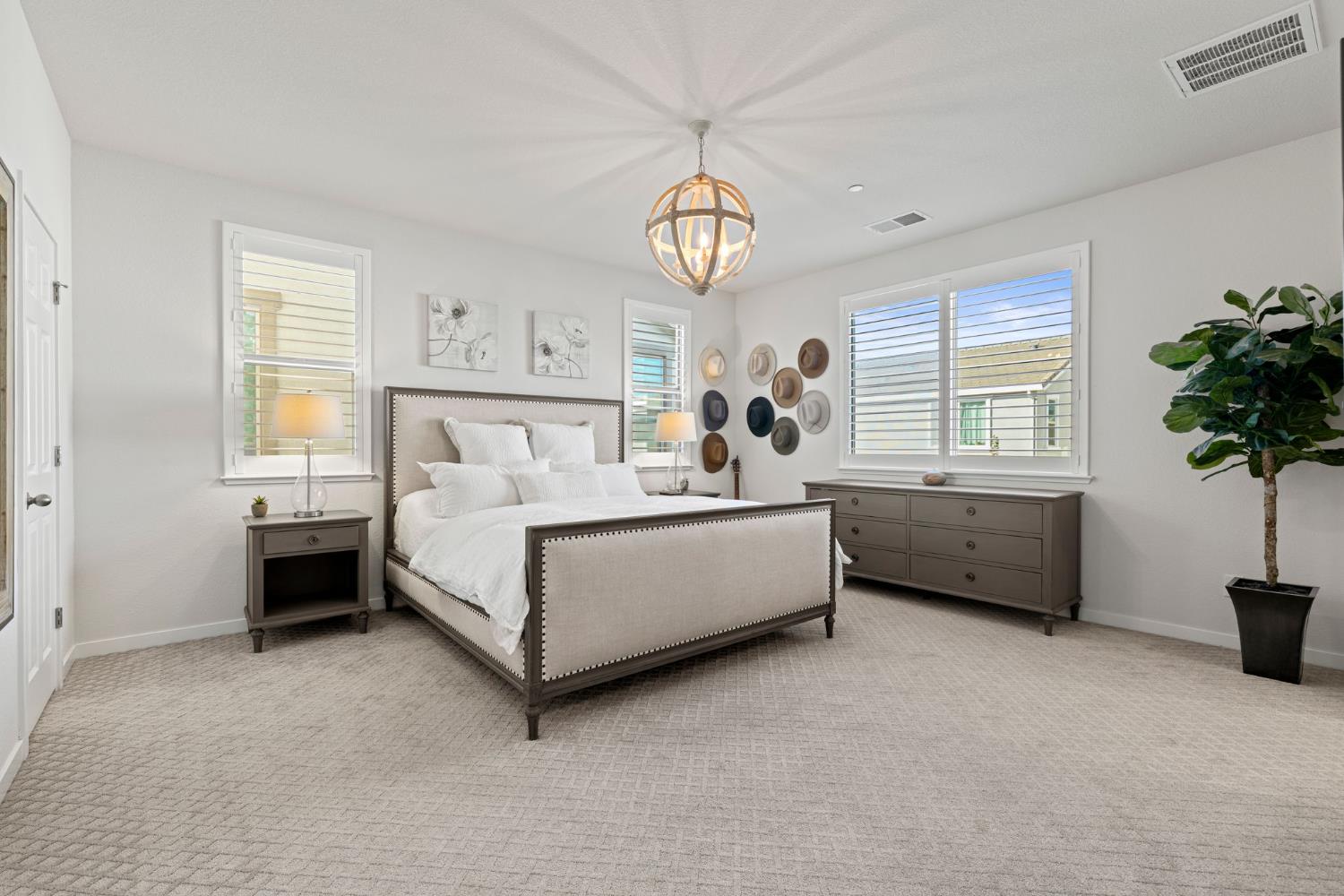 3017 Checkerspot Street Roseville, CA 95747 - Photo 44 of 57 a bedroom with furniture and a large window