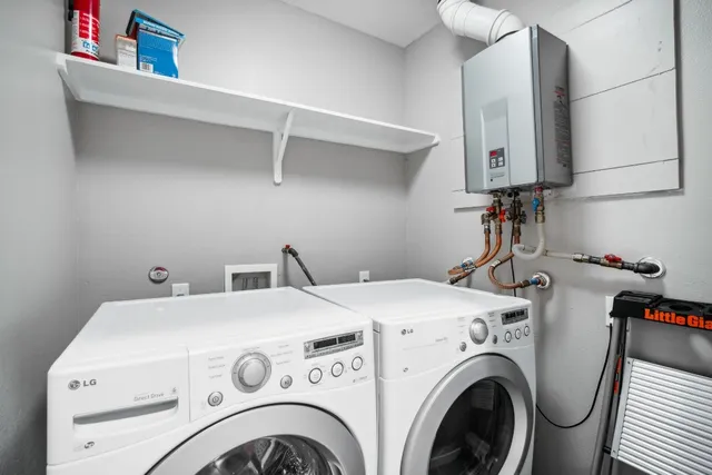 a utility room with dryer and washer