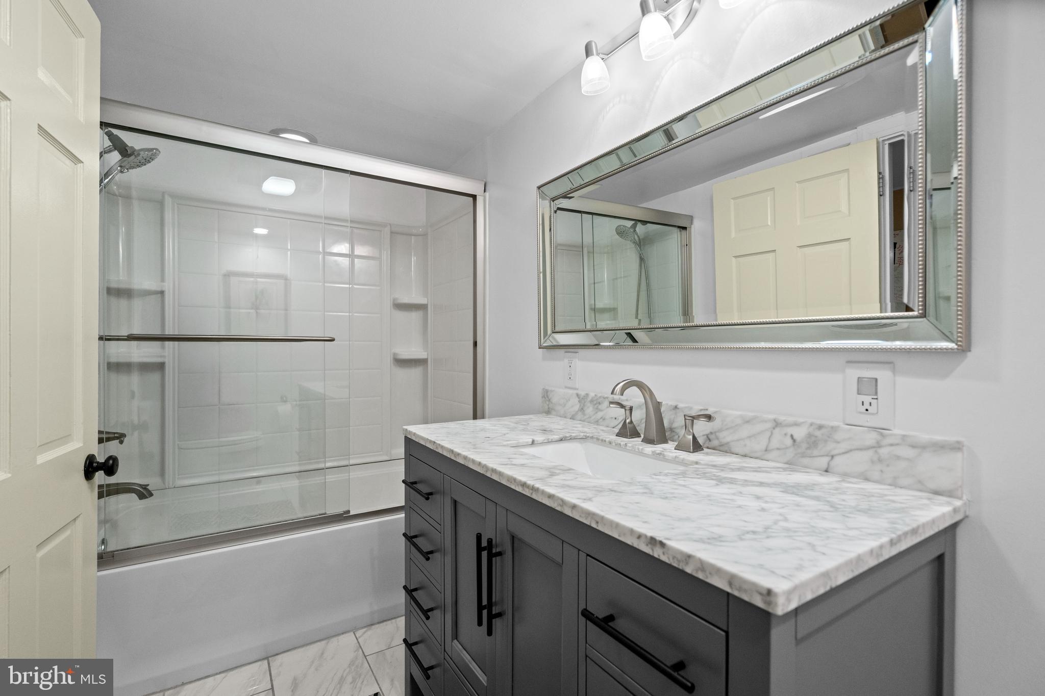 7715 Grasty Road Baltimore, MD 21208 - Photo 27 of 48 Bathroom with Large Tub/Shower