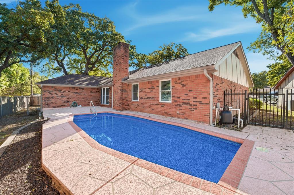 3909 Rustic Forest Trail Arlington, TX 76016 - Photo 14 of 14 a view of a house with a patio
