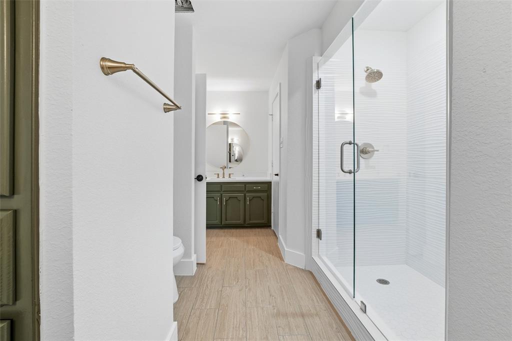 3909 Rustic Forest Trail Arlington, TX 76016 - Photo 7 of 14 a bathroom with a shower and a sink