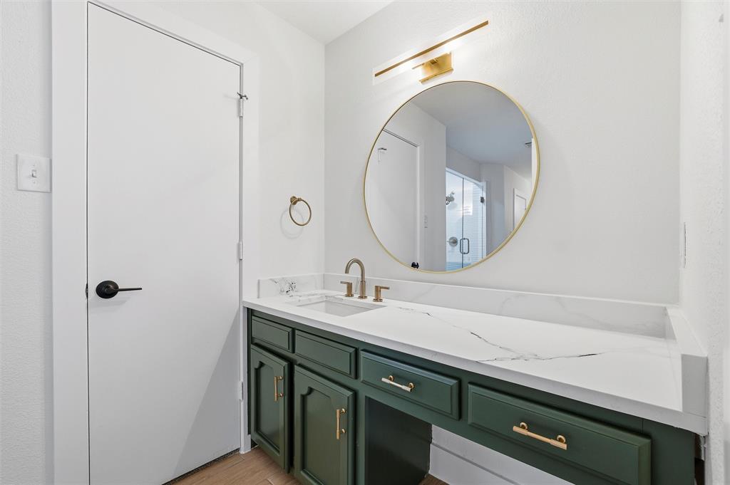 3909 Rustic Forest Trail Arlington, TX 76016 - Photo 8 of 14 a bathroom with a sink and a mirror