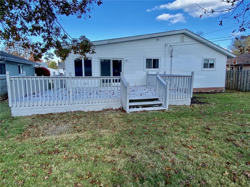 30300 Vineyard Road Willowick, OH 44095 - Photo 14 of 17 Back of property with large deck that has side handicap ramp access.