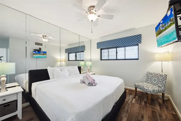 a bedroom with a bed and a table