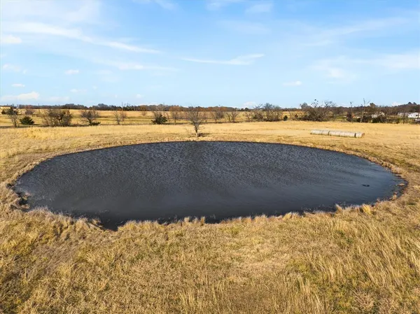 a view of a lake with a beach