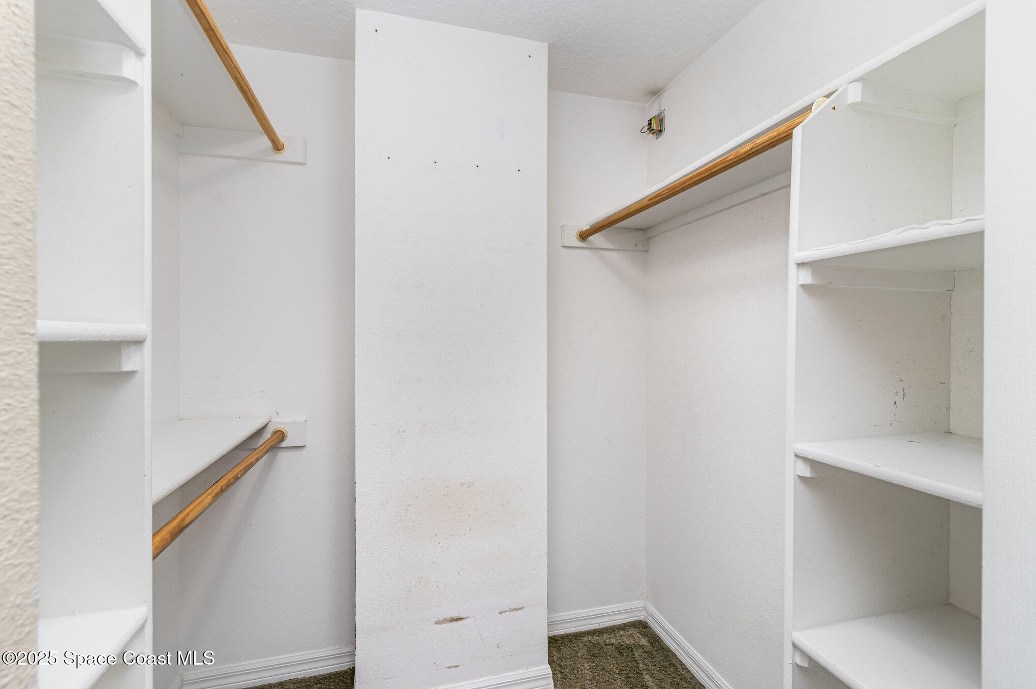 104 Riverside Drive, Unit 403 Cocoa, FL 32922 - Photo 13 of 20 a view of hallway with stairs