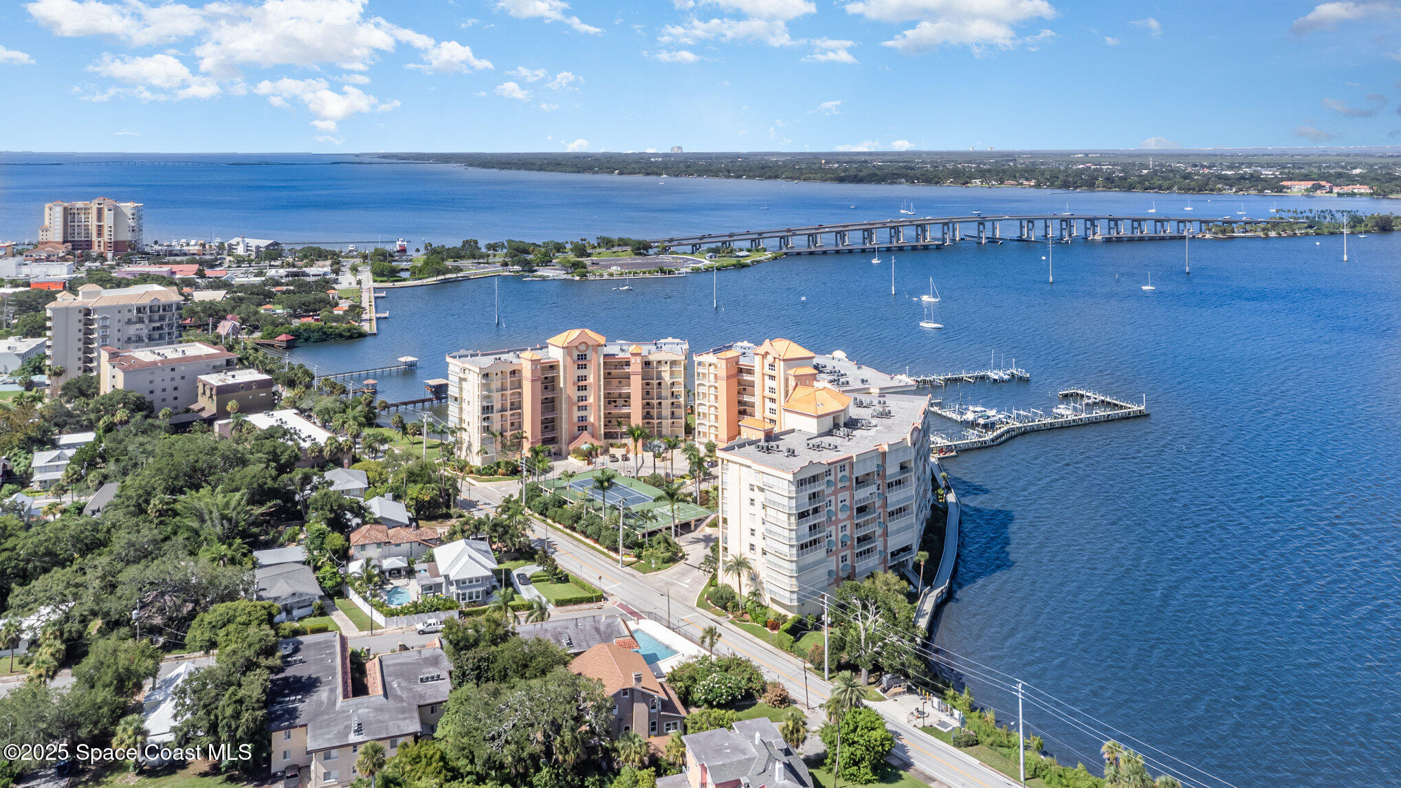104 Riverside Drive, Unit 403 Cocoa, FL 32922 - Photo 2 of 20 a view of a city with an ocean