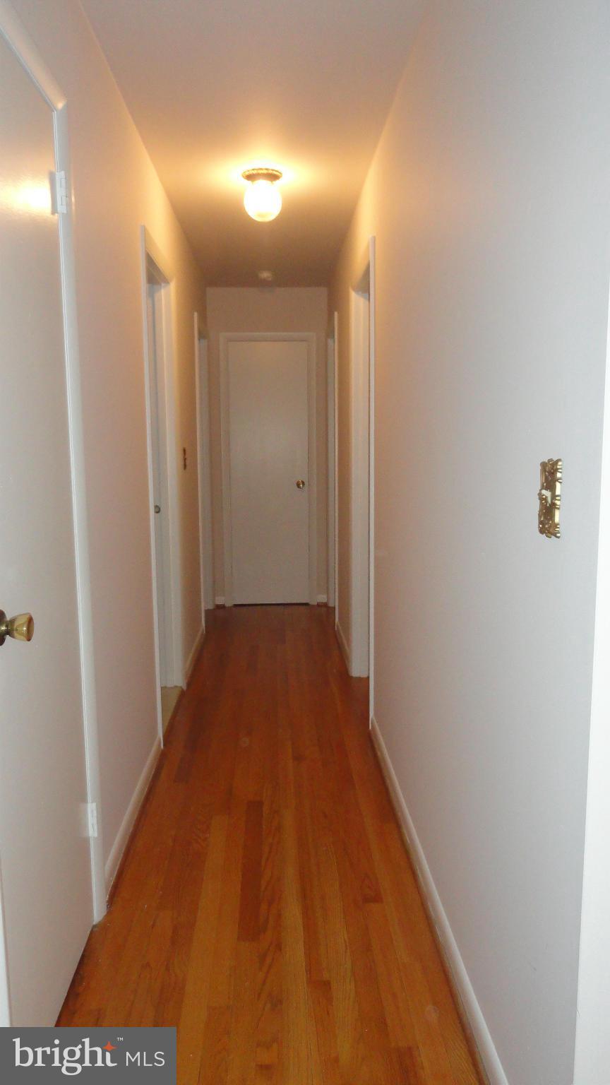 631 Meadow Branch Road Westminster, MD 21158 - Photo 14 of 29 Main Hallway to bedrooms