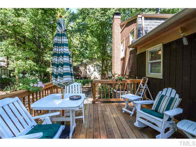 7709 Prospector Place Raleigh, NC 27615 - Photo 17 of 22 Large Deck is great for entertaining guests, that sits on one of the best lots in the neighborhood.