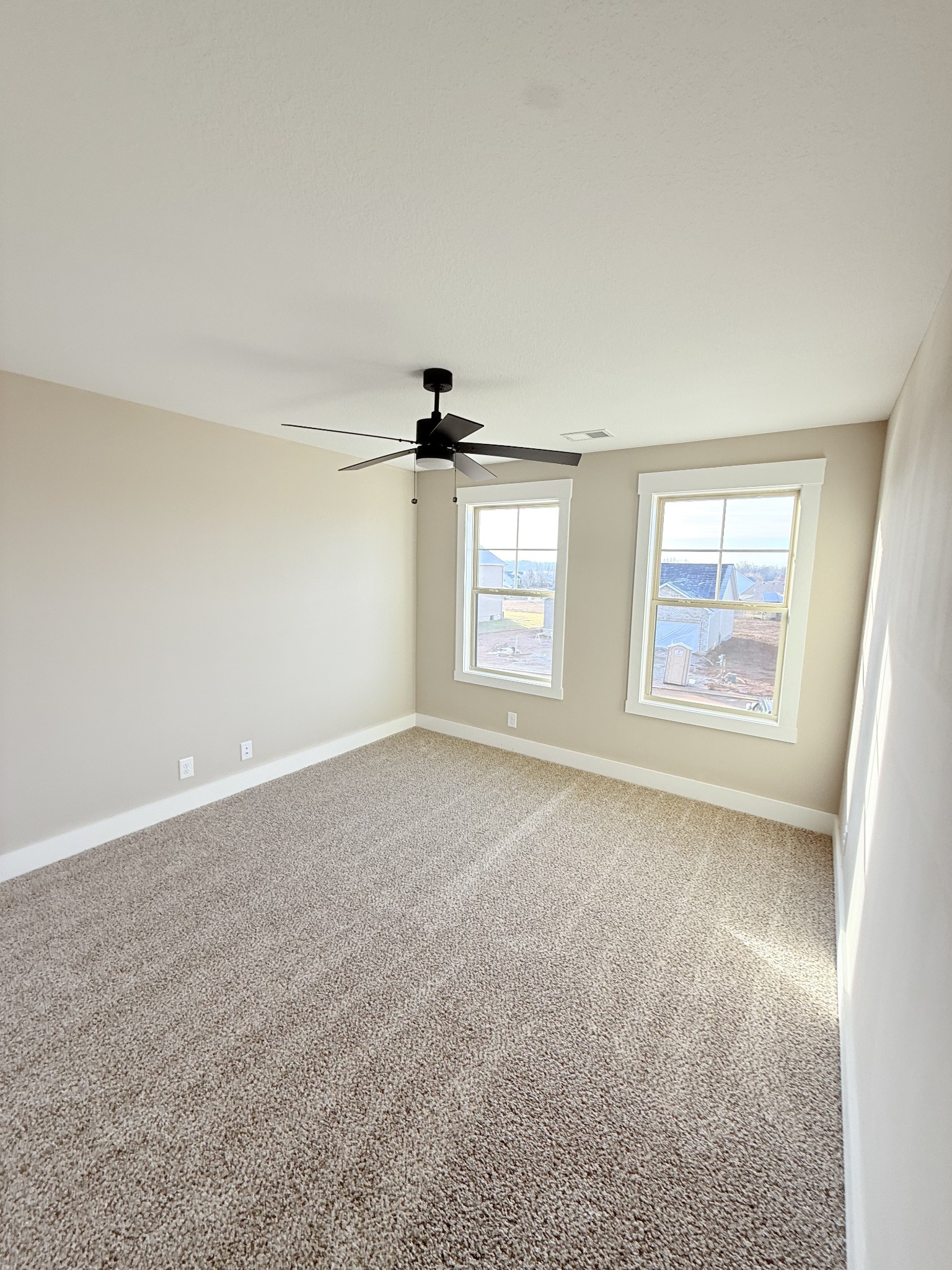 17 Echo Ridge Oak Grove, KY 42262 - Photo 11 of 13 an empty room with windows and ceiling fan